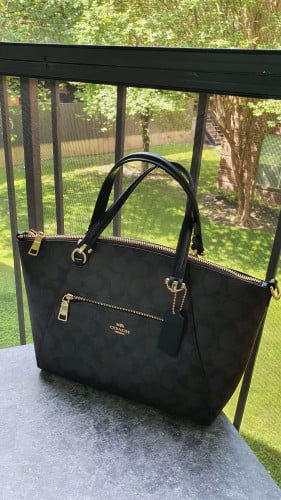 شنطة ماركة كوتش