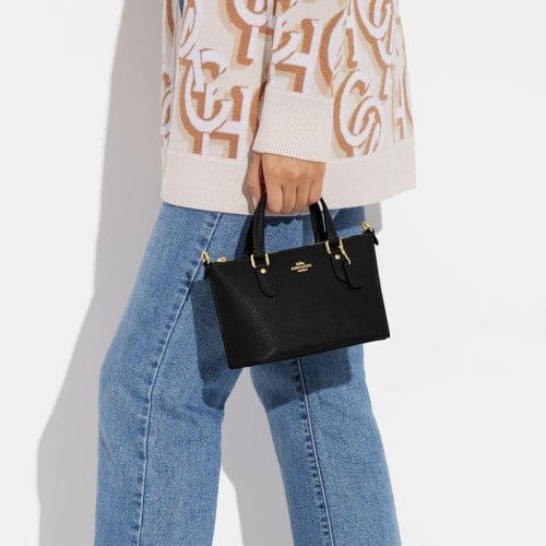 شنطة ماركة كوتش