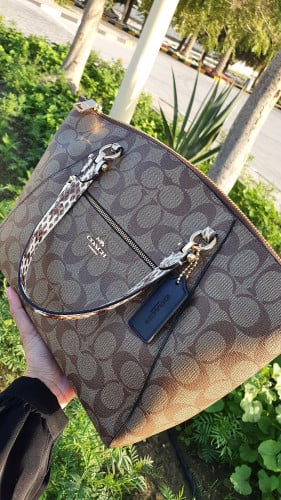 شنطة ماركة كوتش