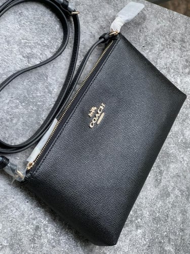 شنطة ماركة كوتش