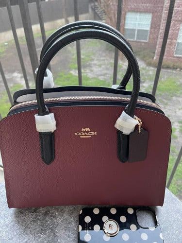 شنطة ماركة كوتش