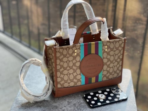 شنطة ماركة كوتش