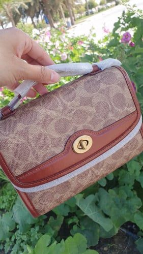 شنطة ماركة كوتش