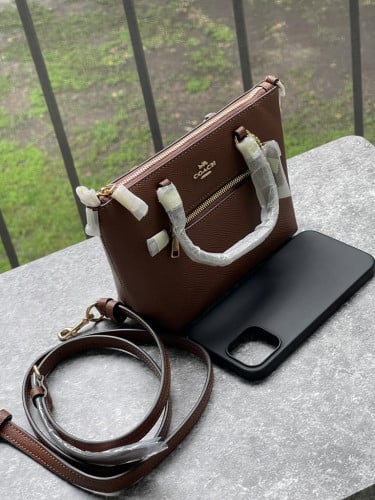 شنطة ماركة كوتش