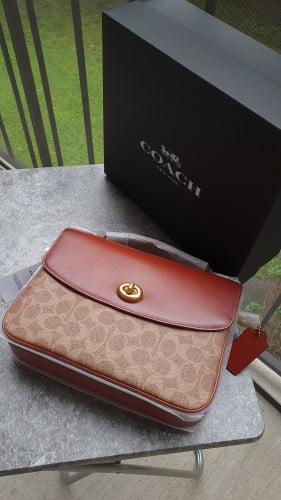 شنطة ماركة كوتش