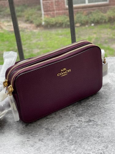 شنطة ماركة كوتش