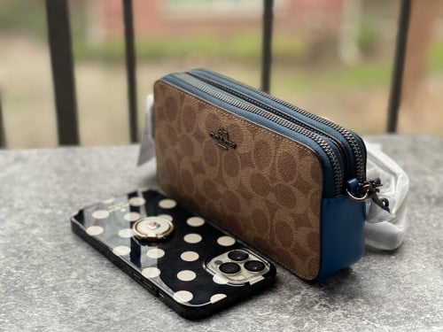 شنطة كروس ماركة كوتش