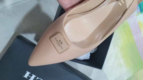 كعب ماركة كوتش