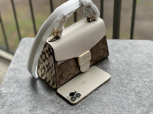 شنطة ماركة كوتش