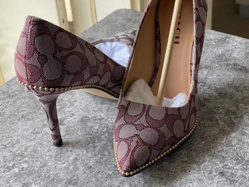 كعب ماركة كوتش