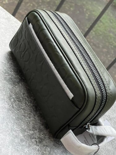 شنطة يد رجالية ماركة كوتش