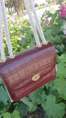 شنطة ماركة كوتش