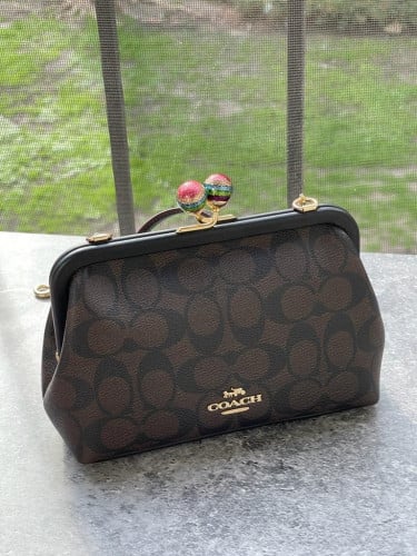 شنطة ماركة كوتش