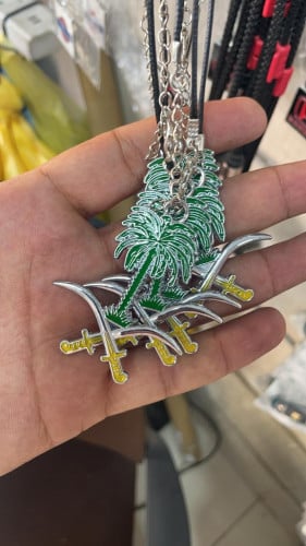 تعليقة سيفين ونخلة (السعوديه) للمرايه