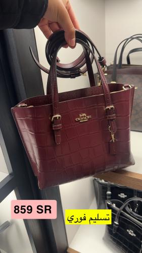 توت coach لون برقندي