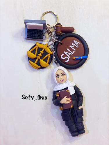 مدالية محامية محجبه