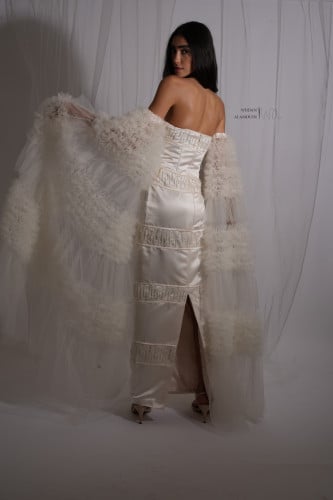 فستان نسائي من التفتة واكمام التل