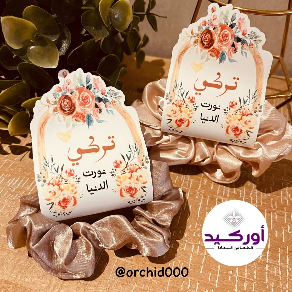 توزيعات ربطة شعر مع التاق