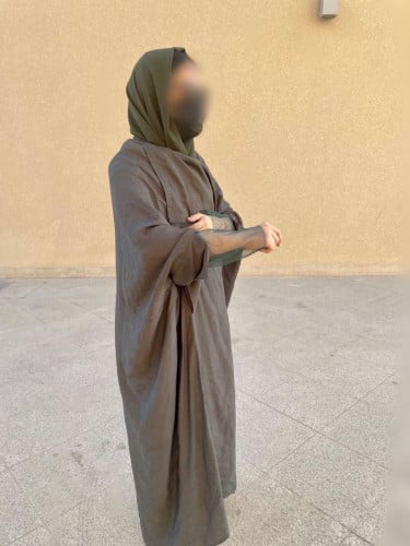 عبايه بقصه قطريه اللون زيني