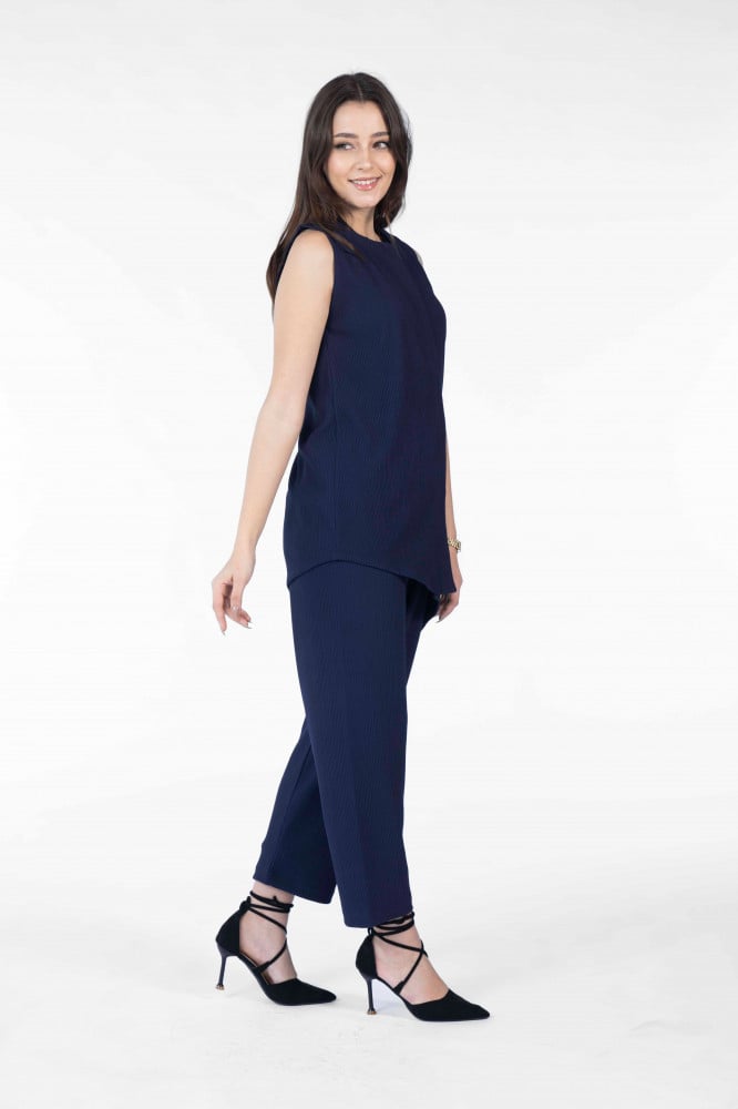 navy blouse black pants