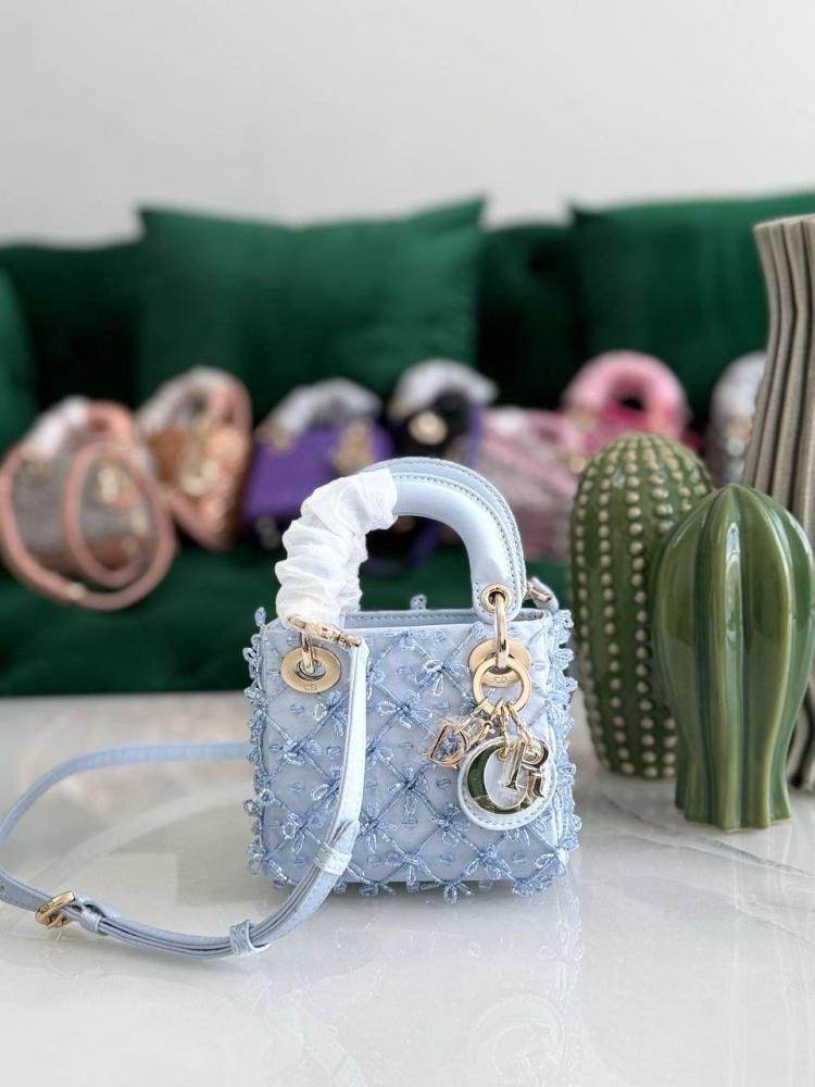 Dior mini handbag with handles and a shoulder strap, blue