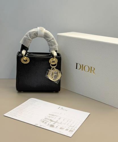 Mini Miu Miu bag with top handles in luxurious leather in silver