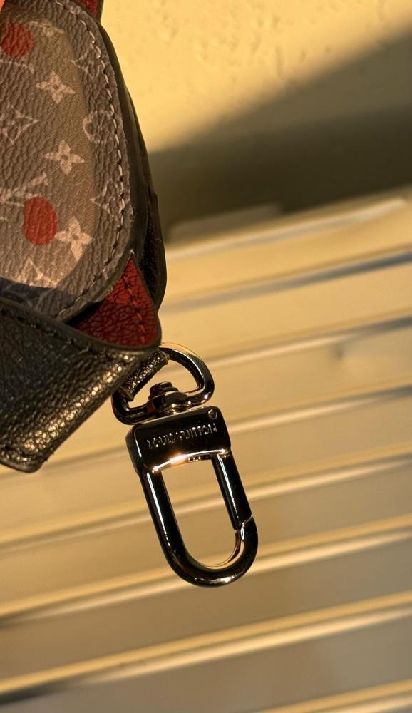 Louis Vuitton bag charm in a cute dog shape, gray and red monogram