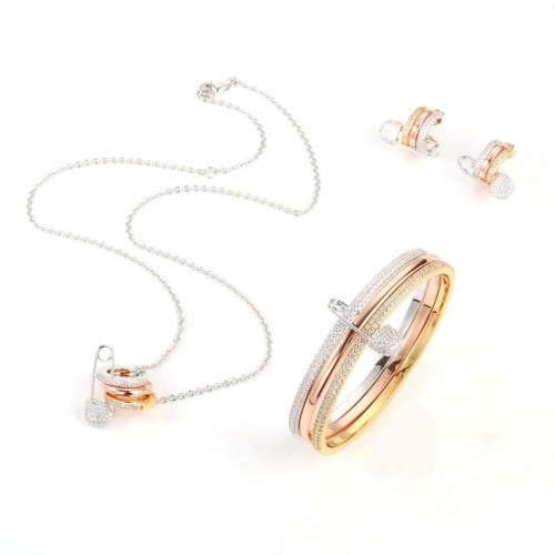 Elegant rose gold studded necklace, bracelet and earring accessory