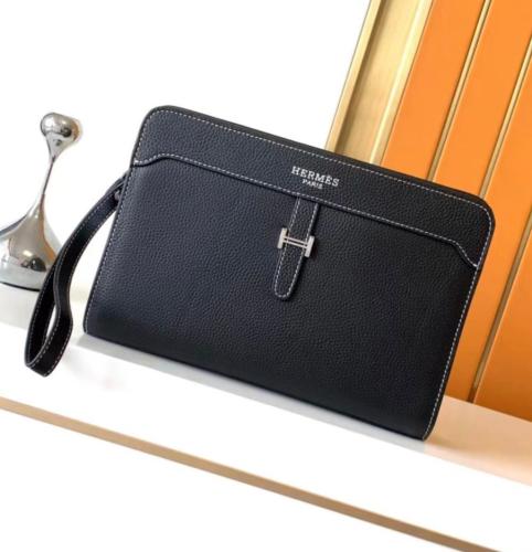 Hermes men's pouch bag in black leather with a silver logo