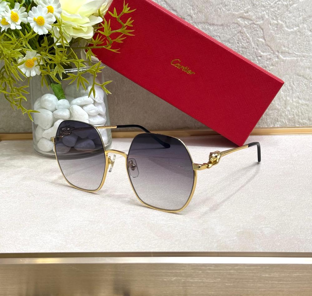 Panthère de Cartier sunglasses with a modern gold and gray metal frame