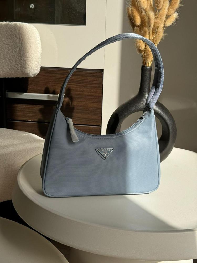 バッグ・カバンその他 PRADA LIGHT BLUE BAG IN PRINTED RE-NYLON Prada Light blue bag in printed Re-Nylon | TheDoubleF