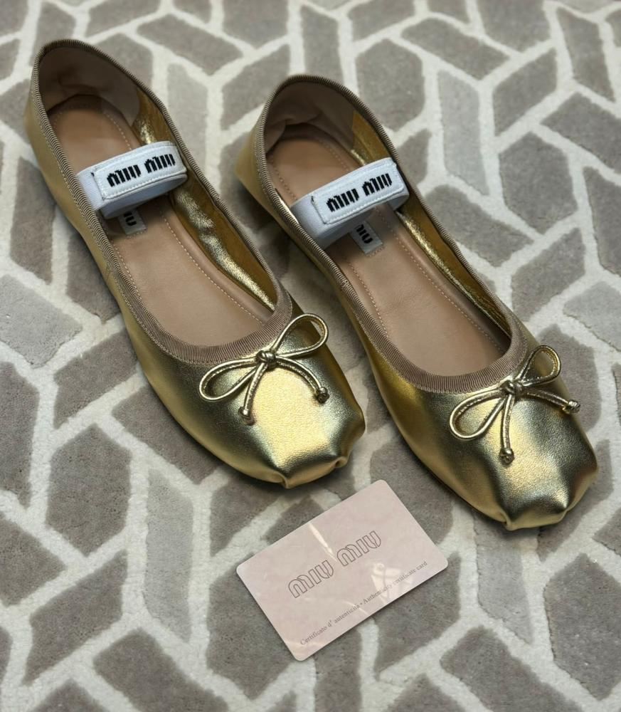 Miu Miu women's elegant gold ballerina with bow