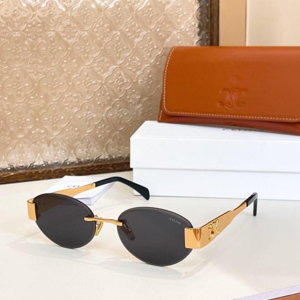 Celine Triumph Metal oval sunglasses with a gold frame and black