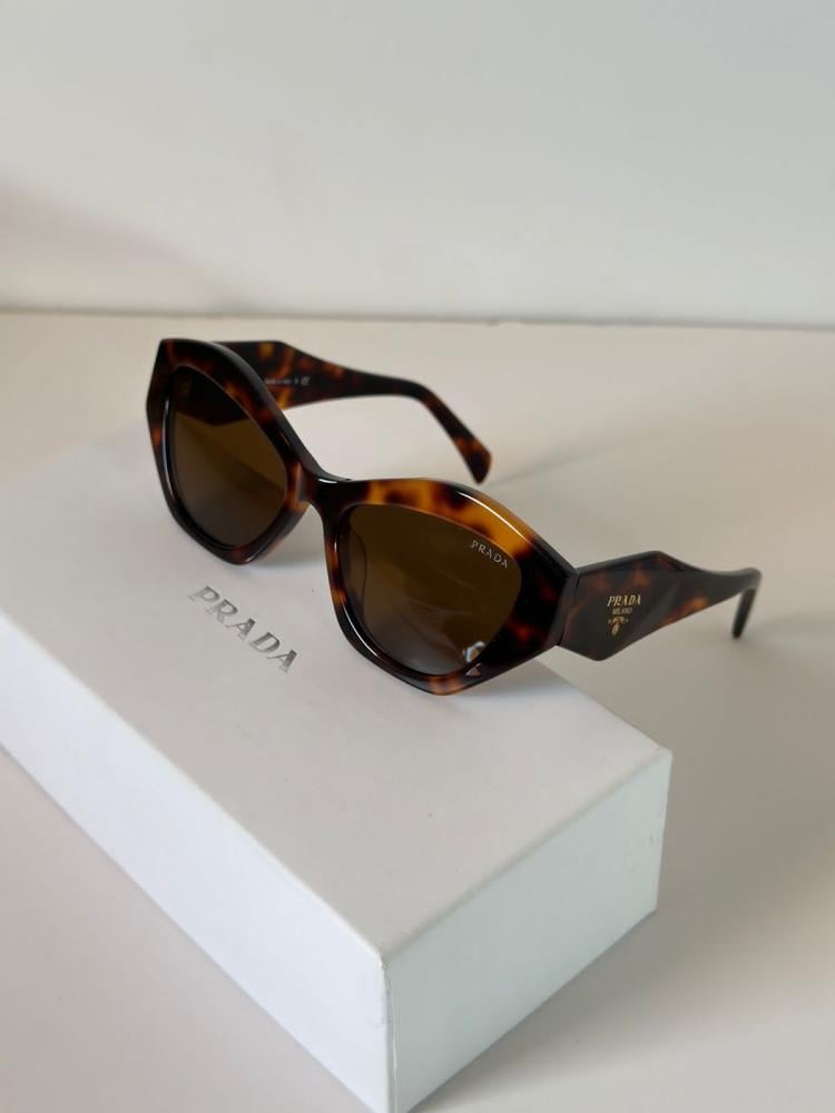 Prada women's sunglasses, elegant honey brown color