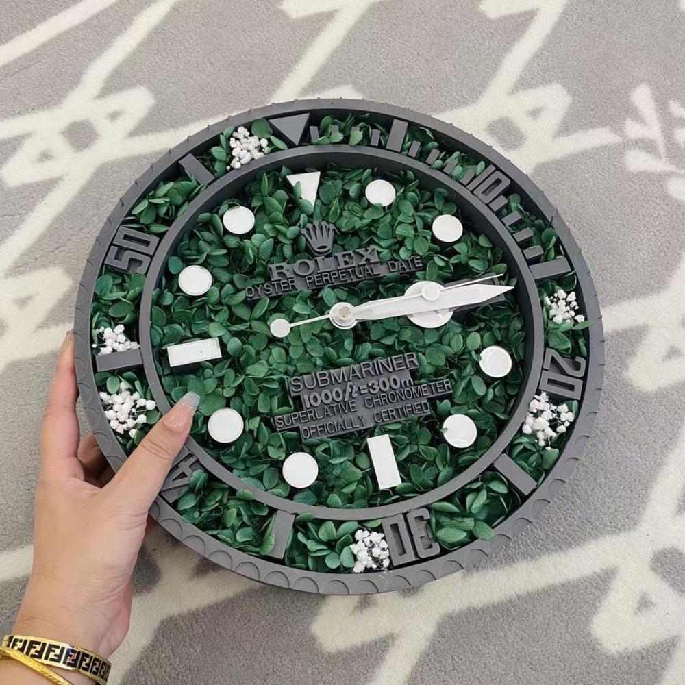 Rolex wall clock, olive green color, with a gray frame