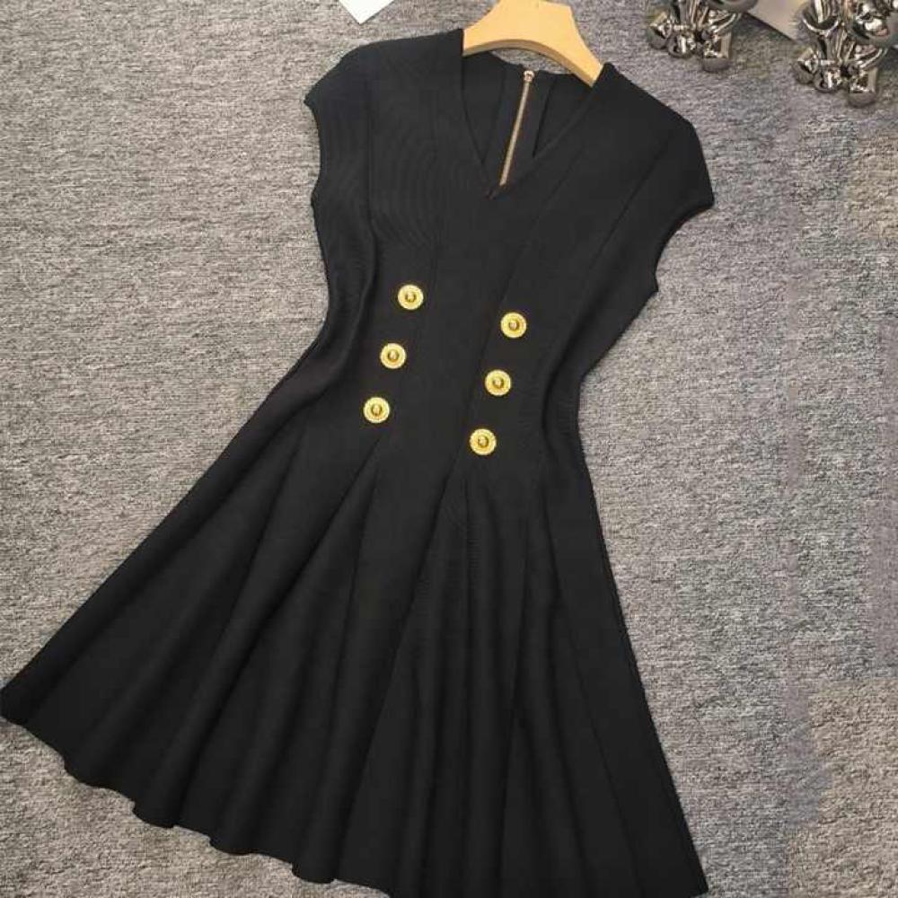 Elegant short dress from Balmain Sport in black with gold