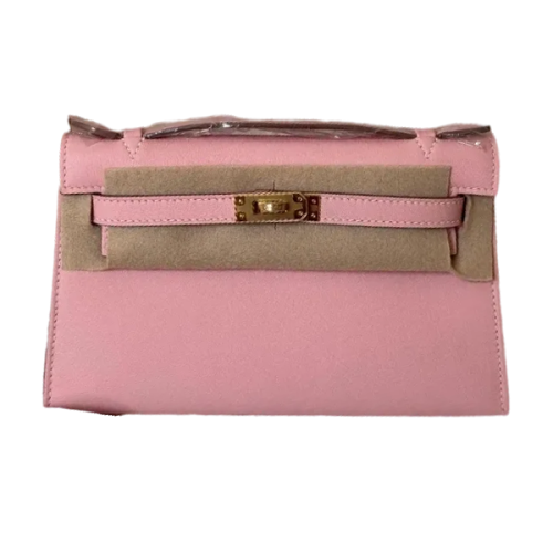 Hermes Kelly leather pouch wallet in pink with gold metal | ESEVEN