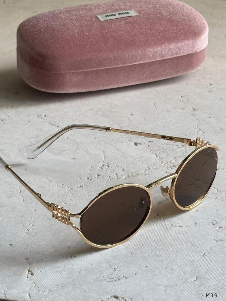 Miu Miu Women's Sunglasses in Brown and Gold
