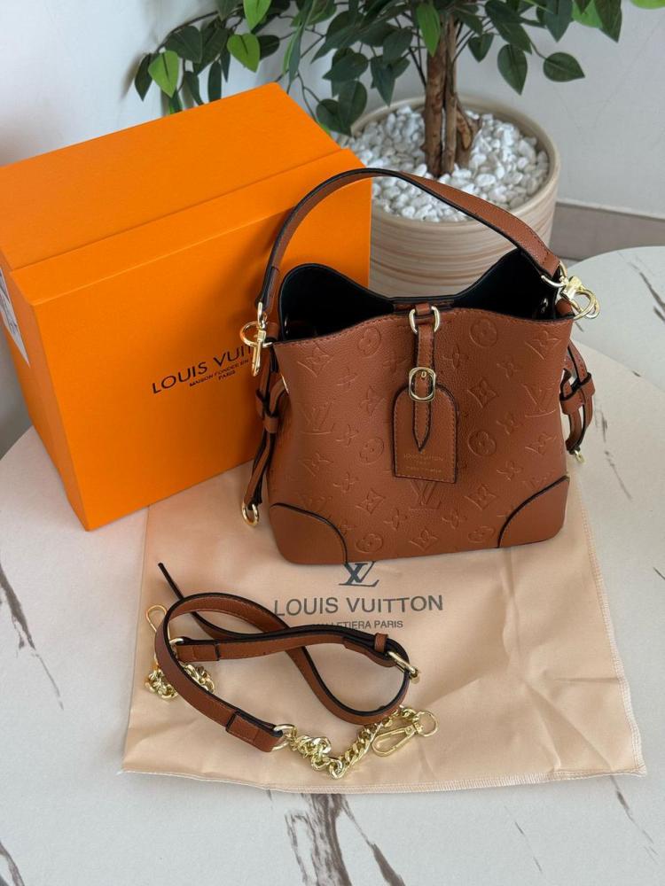 Louis Vuitton women's monogram brown pocket bag | ESEVEN STORE