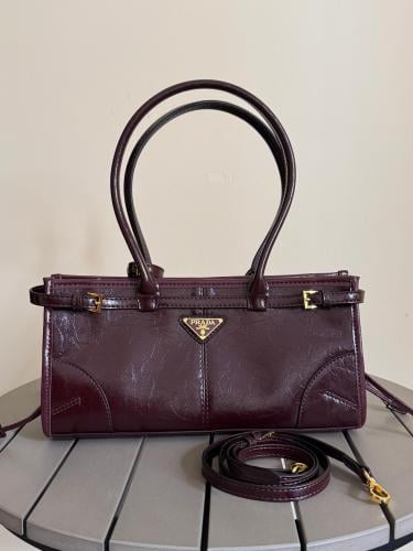 Prada Bonnie 32cm patent leather bag with large handles and