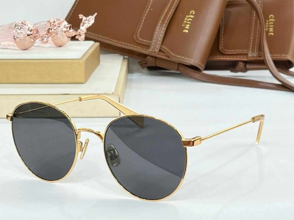 ステラ Celine sunglasses with thin rims in black and gold - E-SEVEN