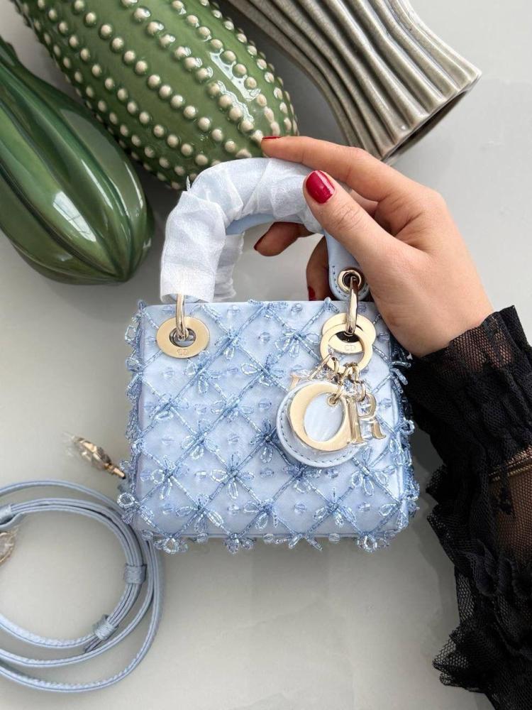 Dior mini handbag with handles and a shoulder strap, blue