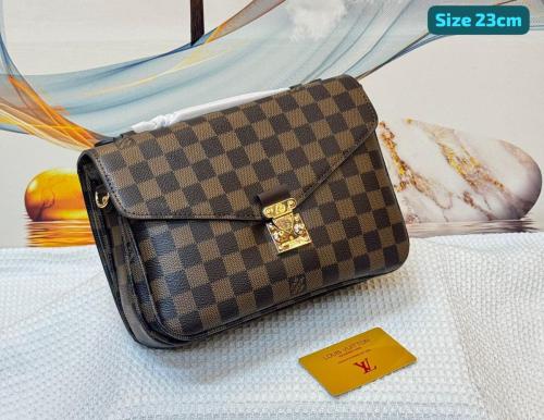 Louis Vuitton Women's 23cm Monogram Chain Flap Bag in Brown