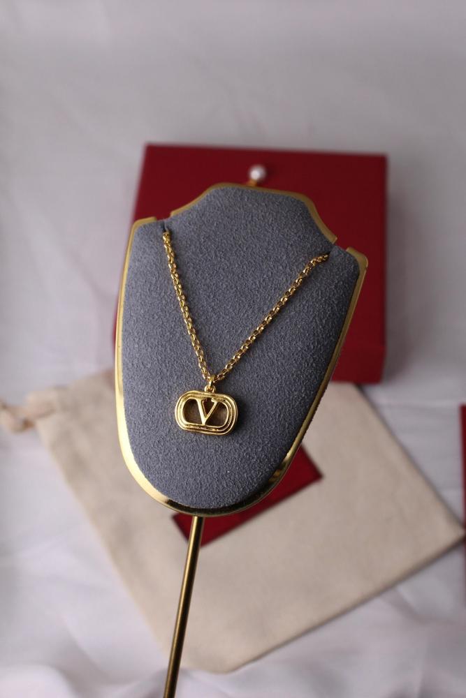 Valentino Ovalette VLOGO Accessory Set: Earrings, Necklace, and Bracelet in Gold