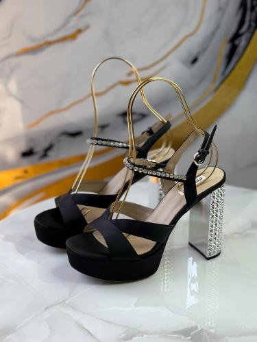 Miu Miu platform evening sandals with a high heel and black