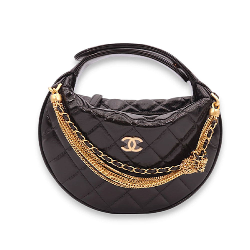 Chanel luxury leather bag with shoulder strap, black and gold