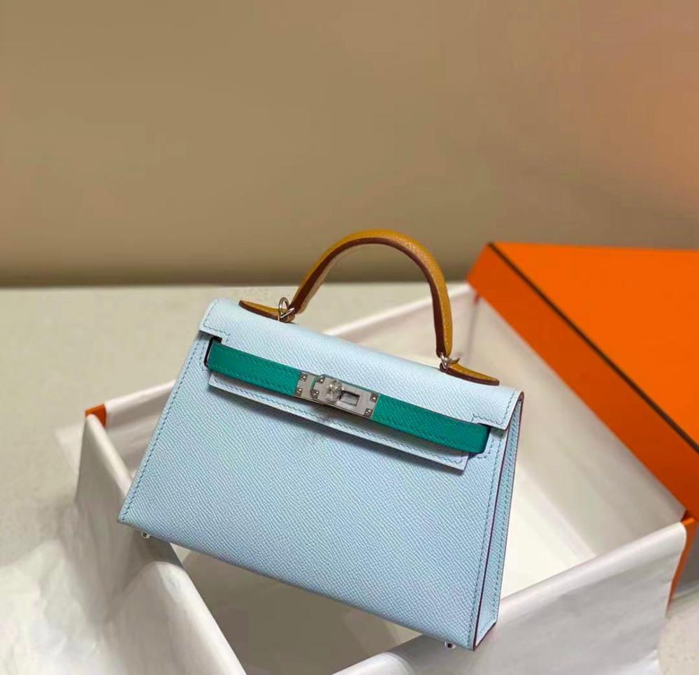 شنطه عصريه هيرميس كيلي بمقبض علوي لون سماوي أخضر وعسلي