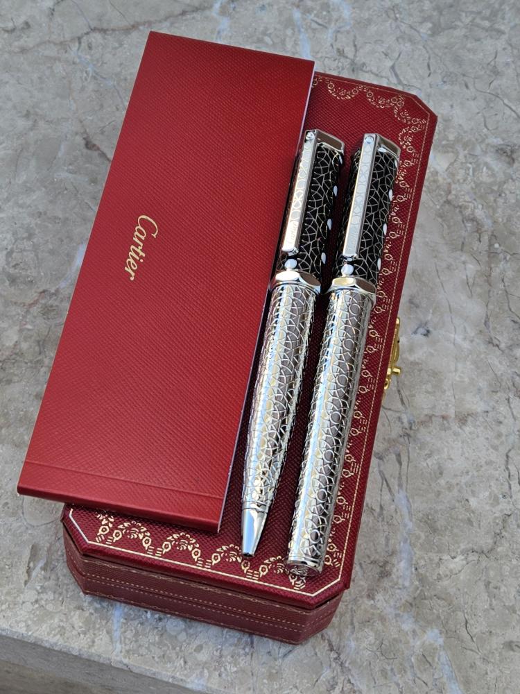 Set of luxury black and silver engraved carte blanche pens