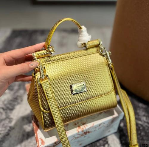 Dolce & Gabbana flap bag with shoulder strap in luxurious gold