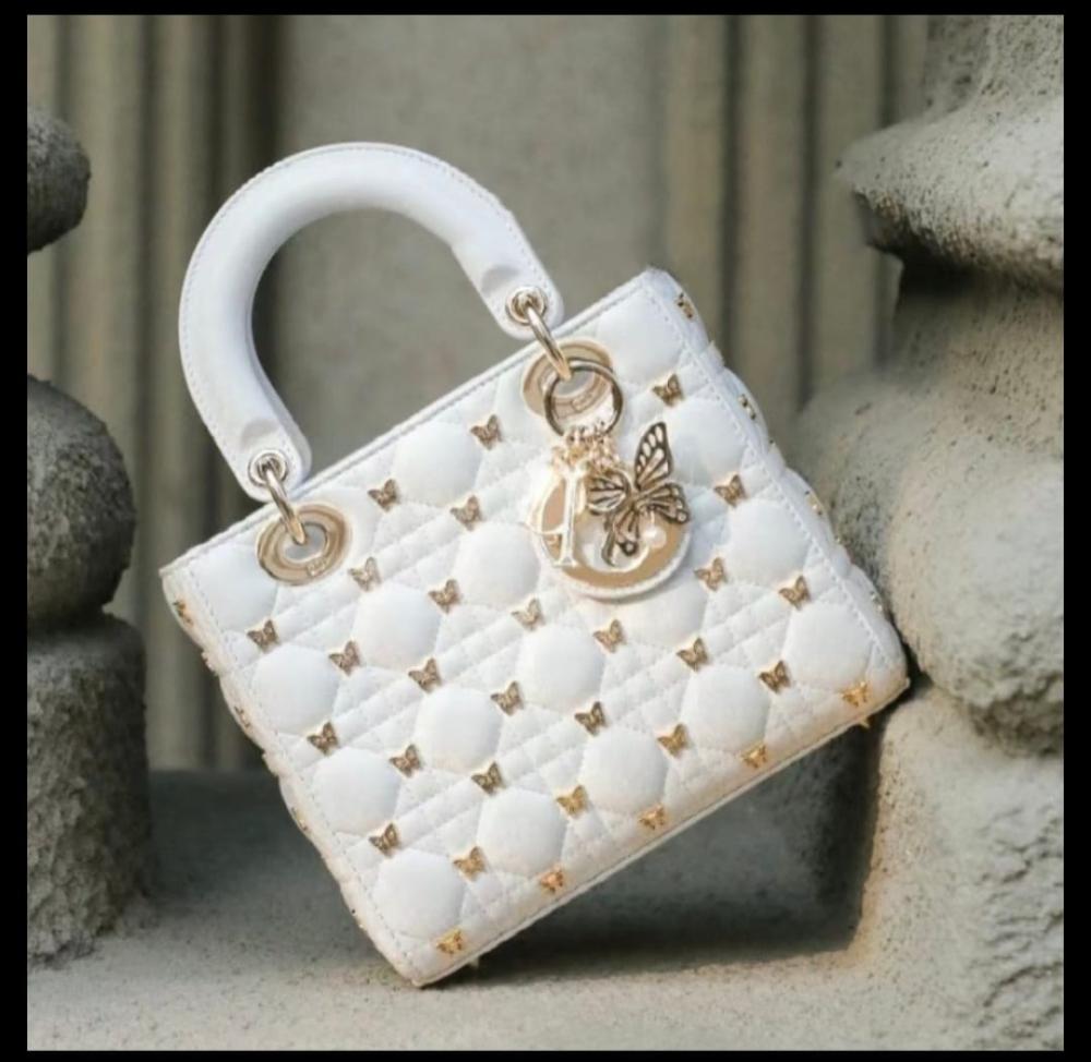 Lady Dior bag studded with butterflies, square pattern